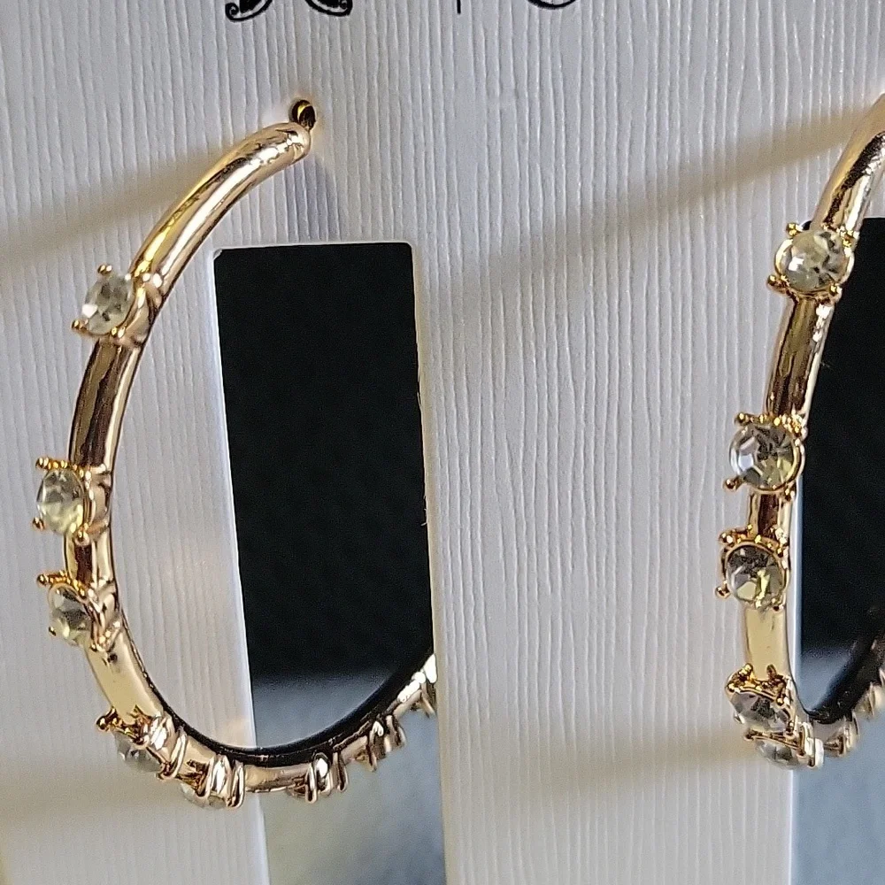 Jessica Simpson Gold Hoop Earrings - Picture 2 of 3
